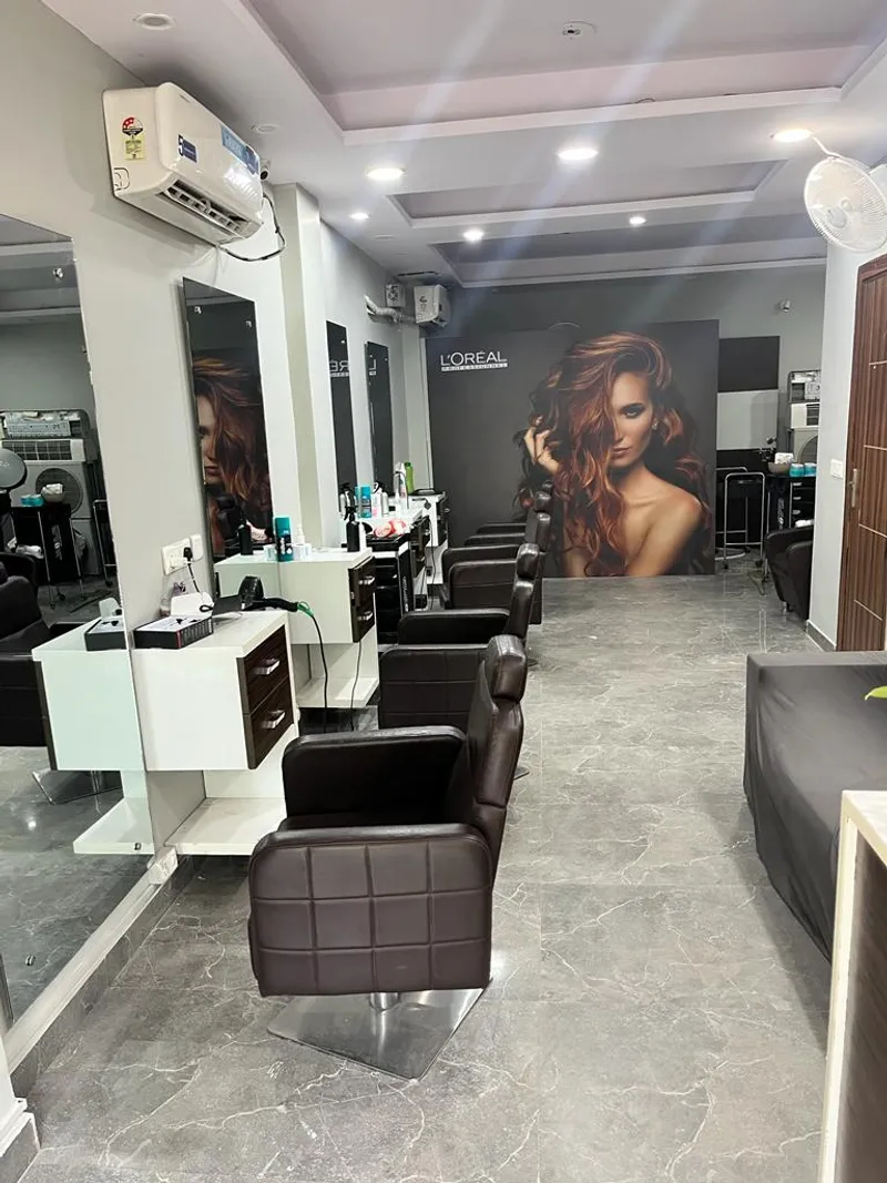 Inside Expression Unisex Salon, showing the salon's chairs and mirrors.